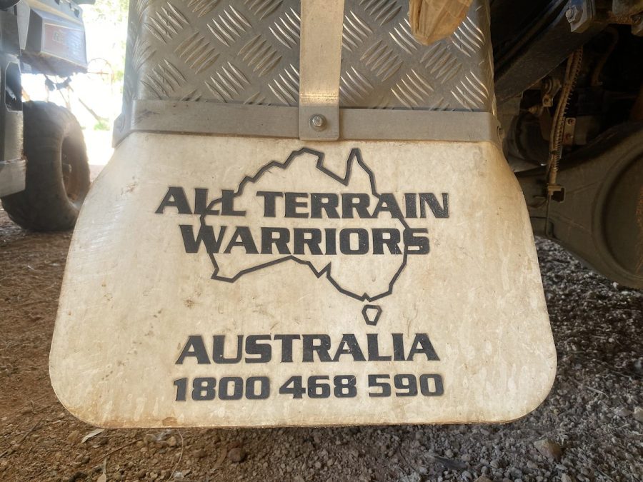 Mud flaps displaying All Terrain Warriors name and logo
